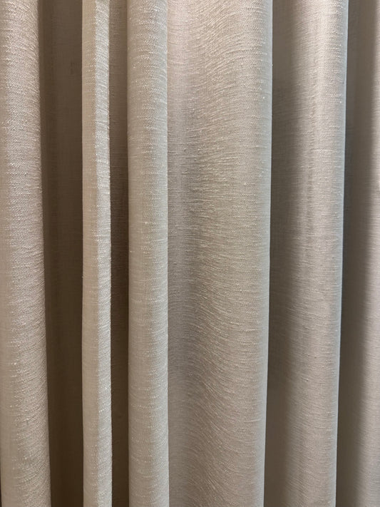 Utility curtain installed as a practical storage screen